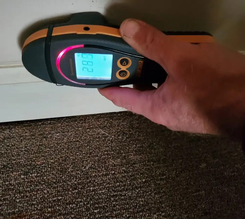 Moisture detection at baseboard during Burst Pipe Cleanup in Lake Wylie